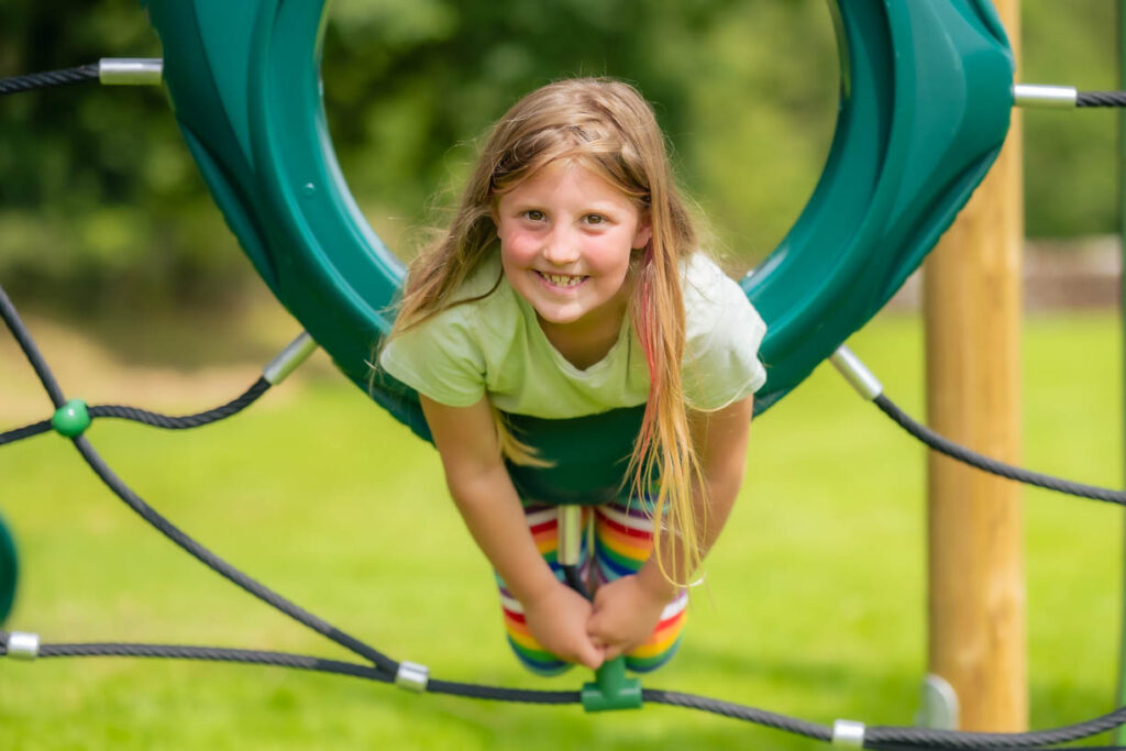 Enjoying the new play park at Calderbridge